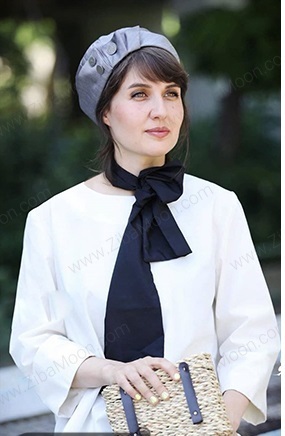 گلوریا هاردی فرانسوی با کلاه و لباس سفید